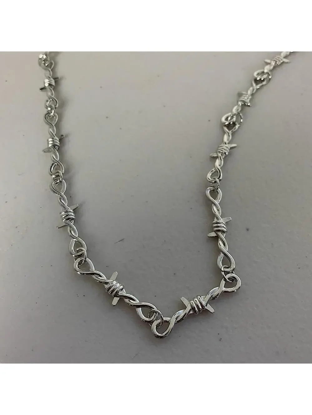 Y2k barbwire opium punk style necklace. Cool design. Nice quality. Chain is